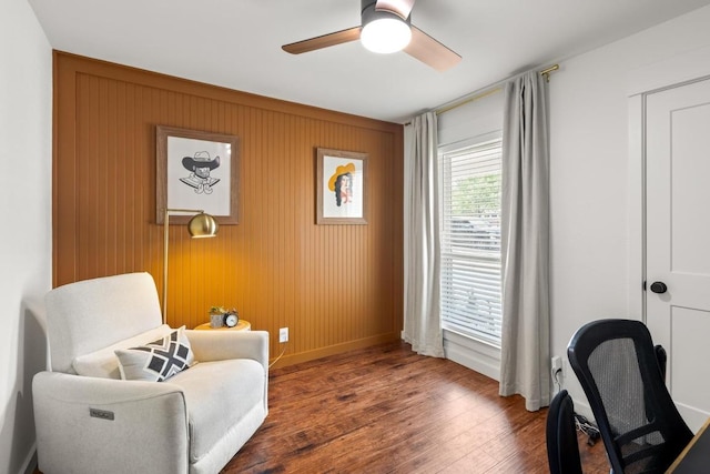 6803 Shadywood Dr, Austin, TX 78745 - living area featuring ceiling fan, wood finished floors, baseboards, and a desk