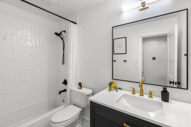 bathroom with vanity, toilet, and bathing tub / shower combination