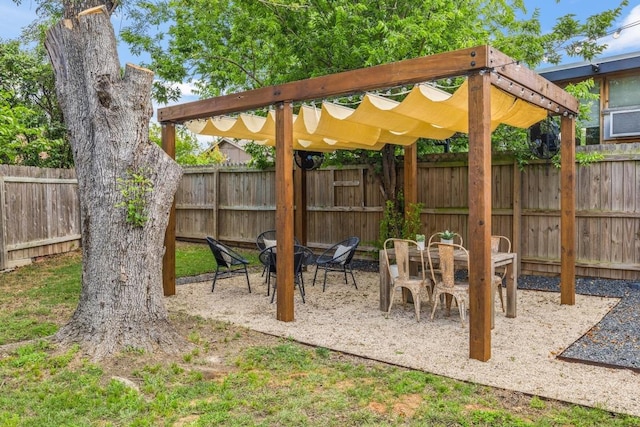 view of patio with a pergola and a fenced backyard