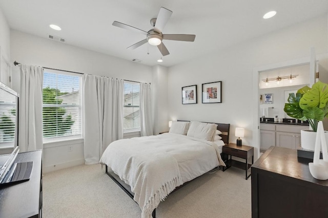 bedroom featuring visible vents, baseboards, ceiling fan, recessed lighting, and light colored carpet
