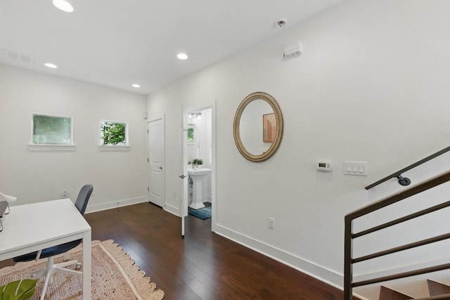 office space featuring visible vents, recessed lighting, wood-type flooring, and baseboards