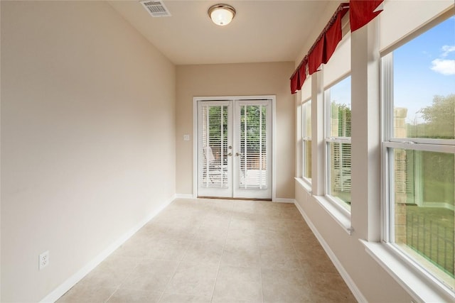 interior space featuring french doors and visible vents
