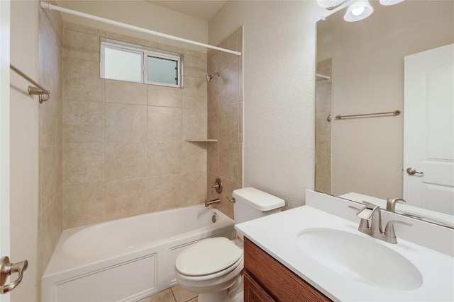 bathroom featuring vanity, toilet, and tub / shower combination