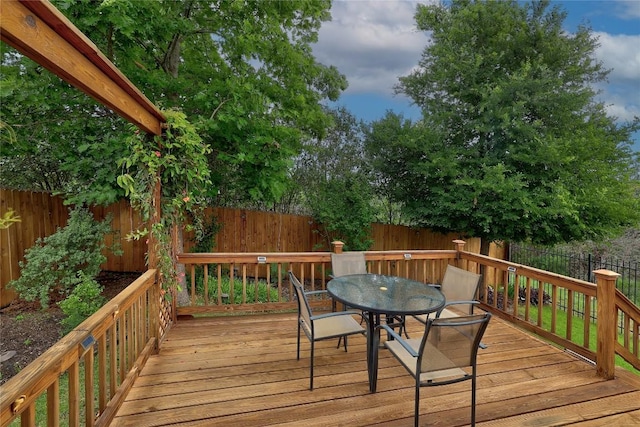 3451 Mayfield Ranch Blvd Unit 369, Round Rock, TX 78681 - wooden terrace with a fenced backyard and outdoor dining area