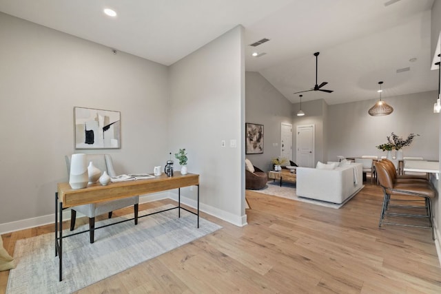 office with ceiling fan, visible vents, baseboards, and light wood-style flooring