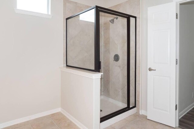7901 SW Pkwy Unit 16, Austin, TX 78735 - bathroom with a stall shower and tile patterned floors