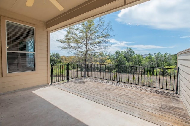 wooden deck with ceiling fan