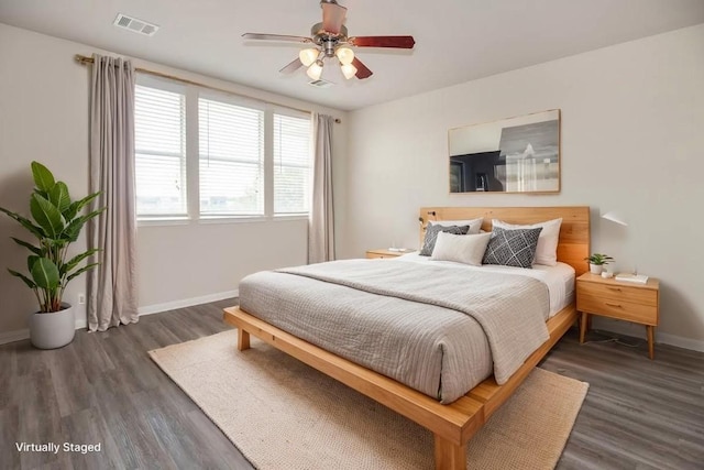 7901 SW Pkwy Unit 16, Austin, TX 78735 - bedroom featuring wood finished floors and a ceiling fan