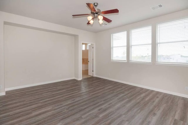 7901 SW Pkwy Unit 16, Austin, TX 78735 - empty room featuring dark wood-style floors and a ceiling fan