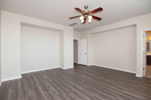 7901 SW Pkwy Unit 16, Austin, TX 78735 - spare room with a ceiling fan and dark wood finished floors