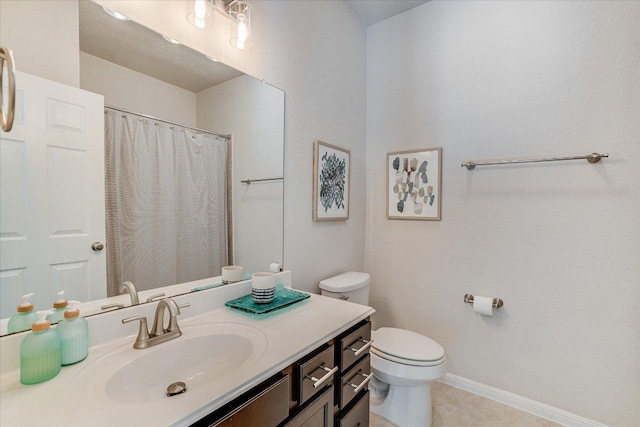 bathroom with tile patterned flooring, vanity, toilet, baseboards, and curtained shower