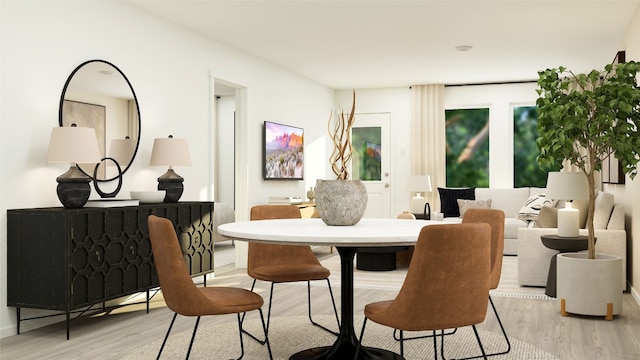 dining area with light wood-style floors