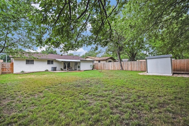 502 Tilbury Ln, Austin, TX 78745 - fenced backyard with a storage unit
