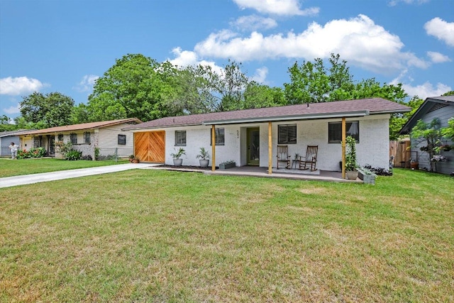 502 Tilbury Ln, Austin, TX 78745 - ranch-style home featuring driveway and brick siding