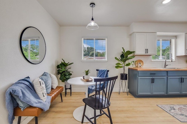502 Tilbury Ln, Austin, TX 78745 - dining area featuring light wood-type flooring and recessed lighting
