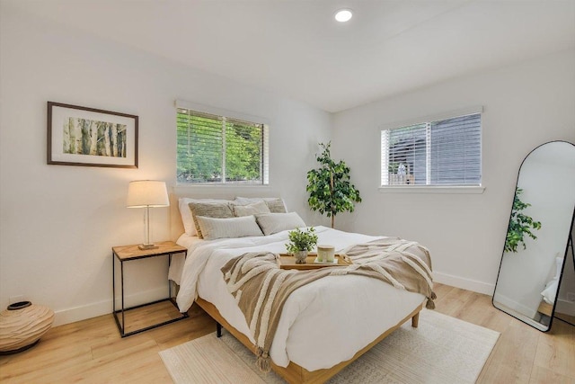 502 Tilbury Ln, Austin, TX 78745 - bedroom with light wood finished floors and recessed lighting