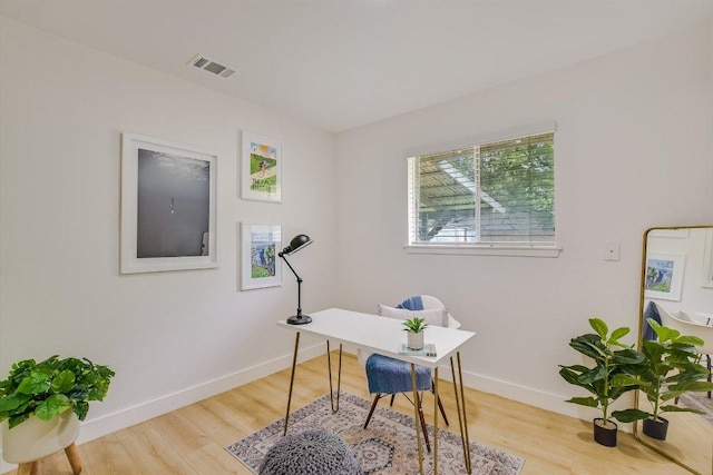 502 Tilbury Ln, Austin, TX 78745 - home office featuring baseboards and light wood-style floors