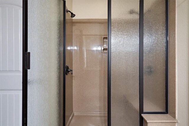 full bath featuring a stall shower
