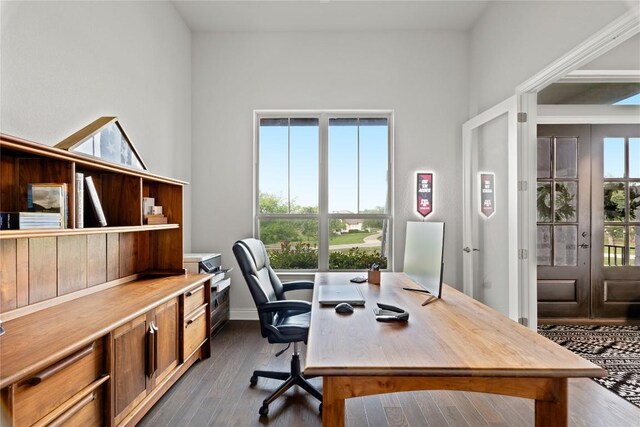 office area with baseboards, dark wood finished floors, and french doors