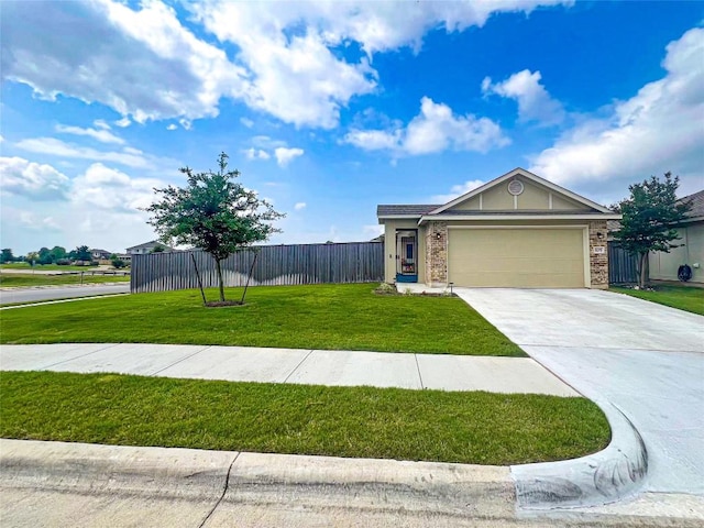 view of front of house with fence, a front lawn, brick siding, a garage, and concrete driveway