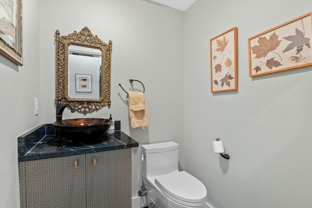 half bath with toilet and vanity