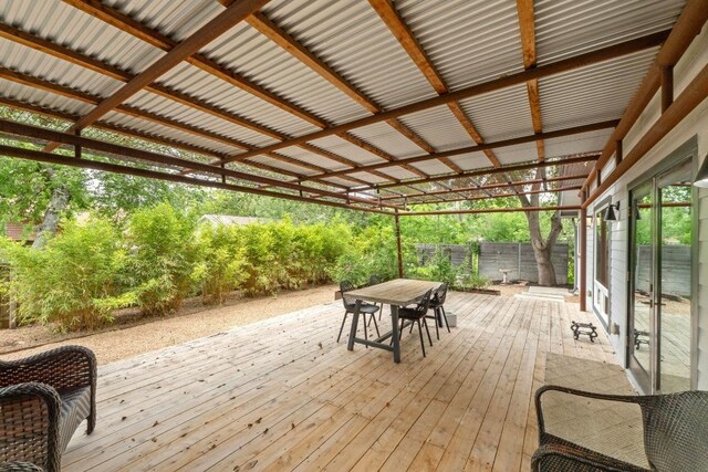 wooden deck with outdoor dining space