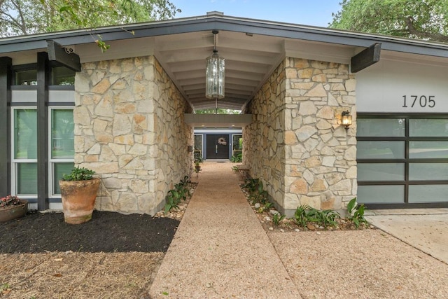 1705 Westmoor Dr, Austin, TX 78723 - doorway to property with stone siding
