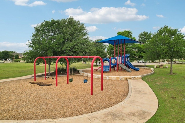 1708 Loyal Friend Dr Unit 46, Leander, TX 78641 - community playground featuring a lawn
