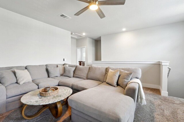 living room featuring visible vents, baseboards, ceiling fan, recessed lighting, and carpet flooring
