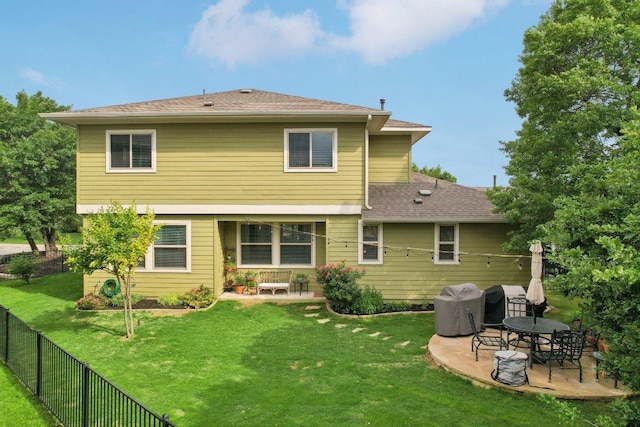 1708 Loyal Friend Dr Unit 46, Leander, TX 78641 - back of property featuring a patio area, a fenced backyard, and a shingled roof