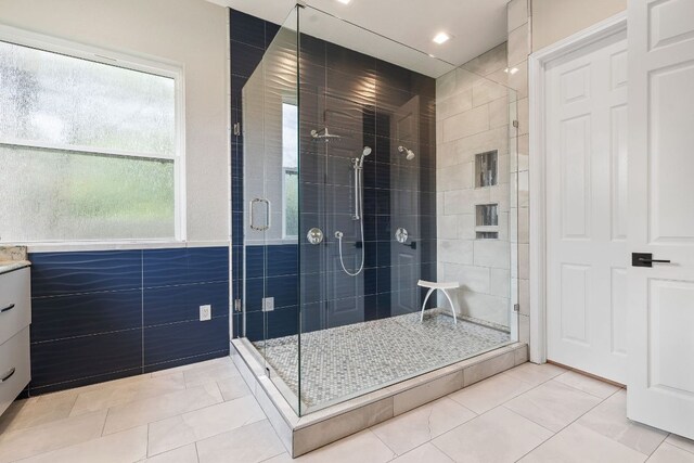 full bath with a shower stall and recessed lighting
