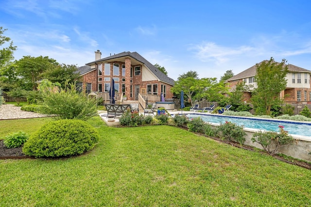 view of yard featuring an outdoor pool