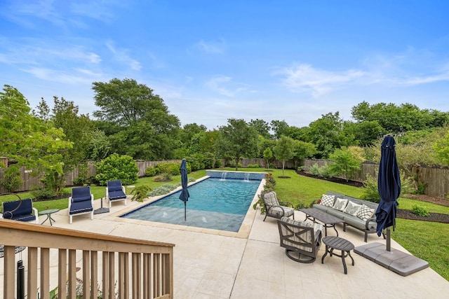 view of pool featuring a fenced backyard, an outdoor living space, a fenced in pool, a patio area, and a lawn