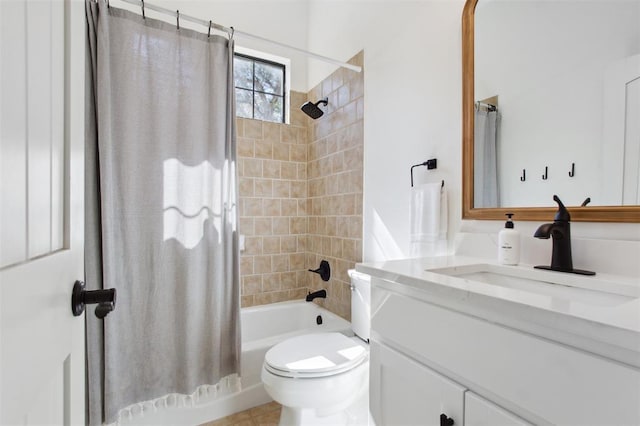 full bath with vanity, toilet, and shower / tub combo with curtain