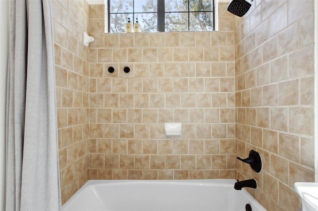 bathroom with shower / bath combo