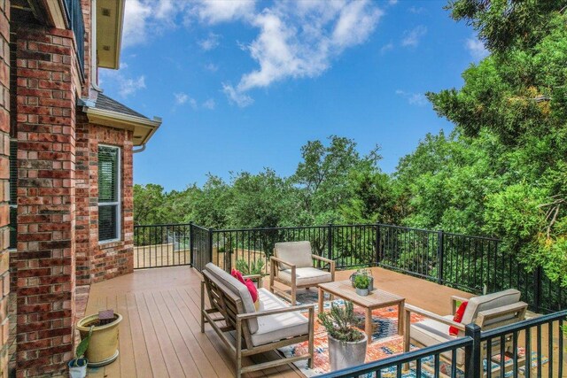 wooden deck with outdoor lounge area