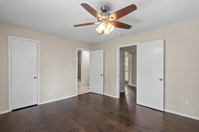 406 W 55th 1/2 St, Austin, TX 78751 - unfurnished bedroom with wood finished floors, baseboards, and ceiling fan