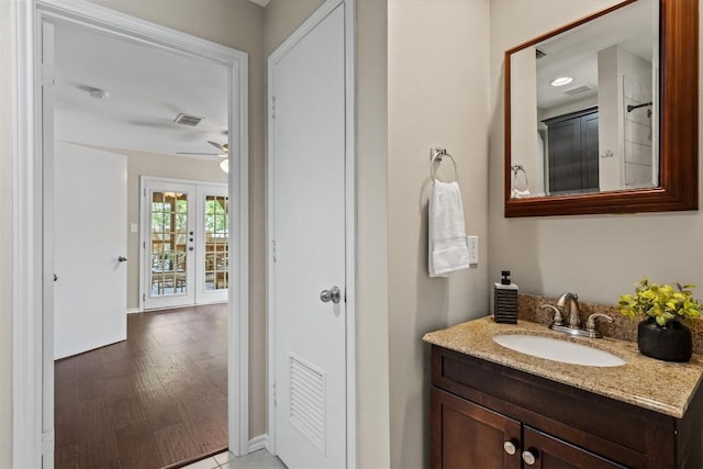 406 W 55th 1/2 St, Austin, TX 78751 - bathroom with vanity and ceiling fan