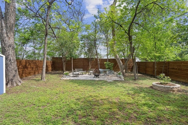 406 W 55th 1/2 St, Austin, TX 78751 - view of yard featuring an outdoor fire pit and a patio area