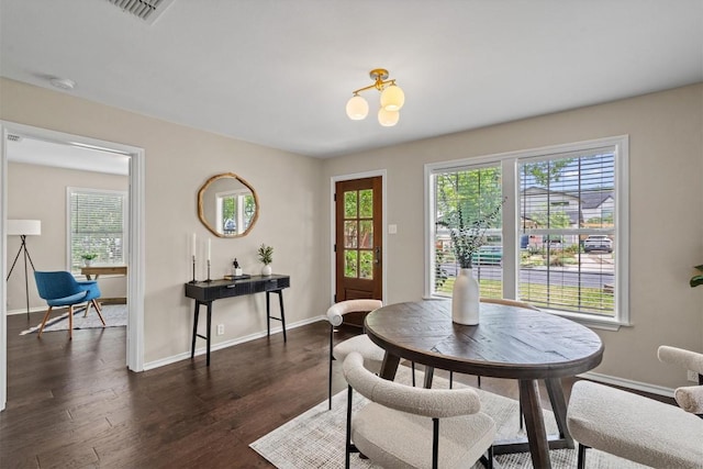 406 W 55th 1/2 St, Austin, TX 78751 - dining room with plenty of natural light and baseboards