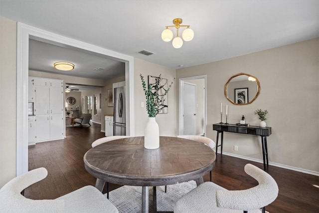 406 W 55th 1/2 St, Austin, TX 78751 - dining room with dark wood-type flooring and baseboards