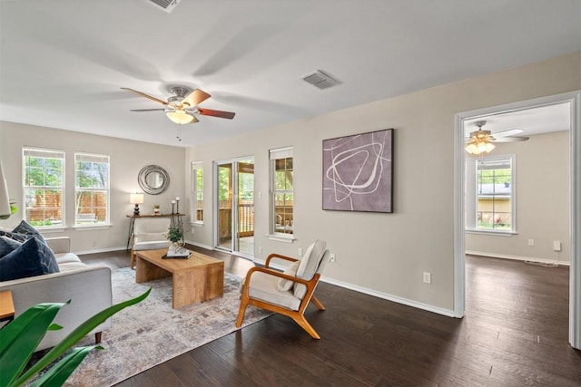 406 W 55th 1/2 St, Austin, TX 78751 - living area featuring a ceiling fan, plenty of natural light, dark wood finished floors, and baseboards