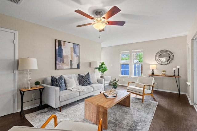 406 W 55th 1/2 St, Austin, TX 78751 - living area featuring ceiling fan, wood finished floors, and baseboards