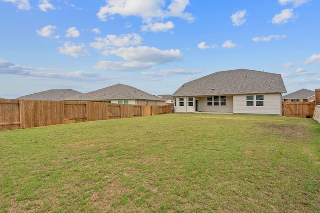 571 Sue Peaks Loop, Dripping Springs, TX 78620 - back of house featuring a fenced backyard and a yard