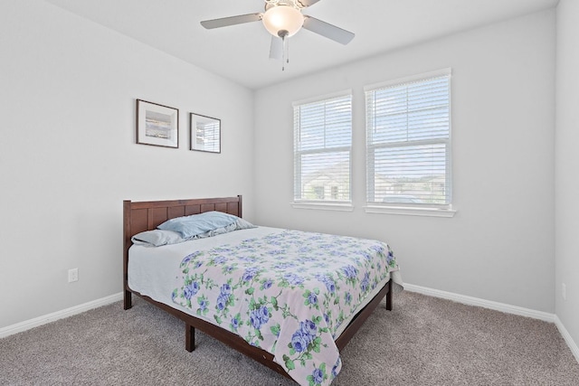 571 Sue Peaks Loop, Dripping Springs, TX 78620 - carpeted bedroom with baseboards and a ceiling fan