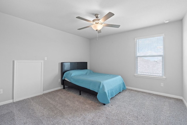 571 Sue Peaks Loop, Dripping Springs, TX 78620 - carpeted bedroom featuring baseboards and a ceiling fan