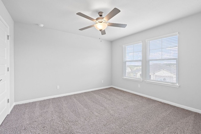 571 Sue Peaks Loop, Dripping Springs, TX 78620 - empty room with carpet floors, baseboards, and a ceiling fan