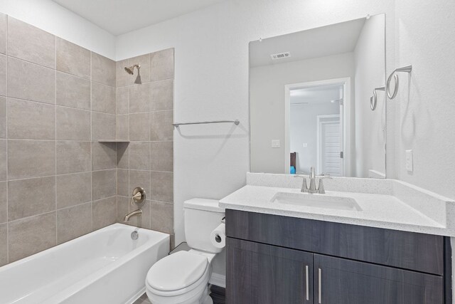 571 Sue Peaks Loop, Dripping Springs, TX 78620 - bathroom with vanity, shower / bathtub combination, visible vents, and toilet