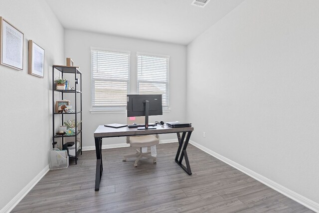 571 Sue Peaks Loop, Dripping Springs, TX 78620 - home office featuring baseboards and wood finished floors
