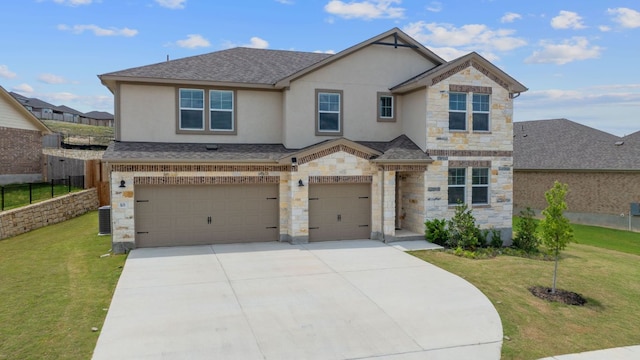 571 Sue Peaks Loop, Dripping Springs, TX 78620 - view of front of house with an attached garage, stucco siding, driveway, and a front yard